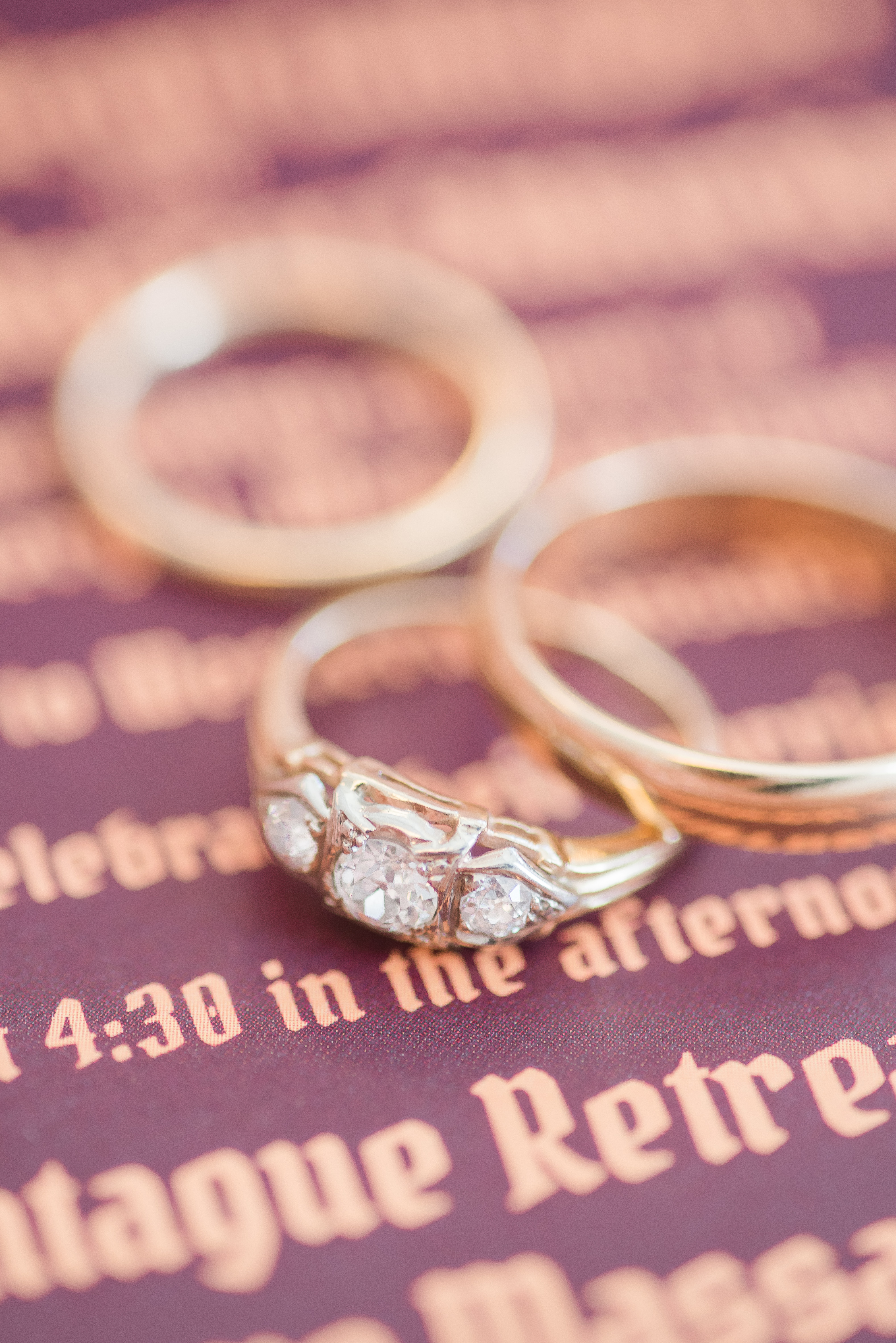 three rings on a wedding invitation